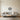 Sun, moon and stars metal wall art hanging above a bed