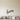 Black Treble Clef Leading a Curving Staff Metal Wall Art on a light wall