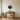 Vinyl record wall art hanging above a record player in a living room