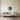 Woman profile with flowing hair wall art hanging on a wall in a bedroom