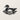 Front view of the wood duck silhouette in profile above wavy water lines
