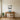 Woolly sheep wall art hanging on a wall in a nursery